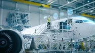 Concept Of: In Hangar Engineer Holding Tablet Computer Standing On A Ramp Stock Footage