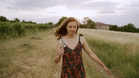Concept happy holidays. Beautiful young woman smiling and dancing in vineyard. Stock Footage 111237383