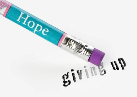 Concept of hope erasing the idea of giving up using an eraser analogy Stock Illustration