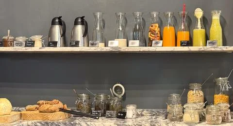 A concept of hotel breakfast buffet with drinks food on marble counter Stock Photos