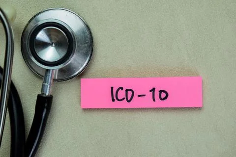Concept of ICD-10 write on sticky notes with stethoscope Stock Photos