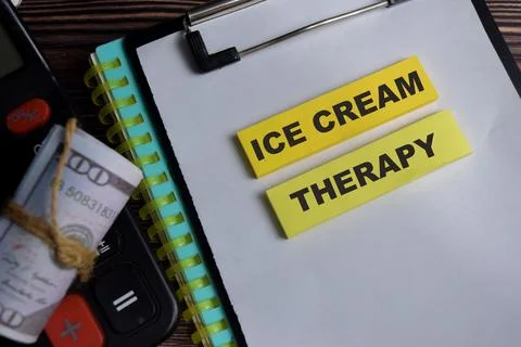 Concept of ice cream therapy write on sticky notes isolated on Wooden Table. 스톡 사진