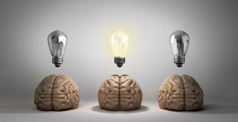 Concept idea arose three brain lie on the floor and one of them emits light b Stock Illustration