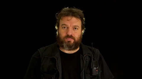 Concept idea: Bearded construction worker pulls construction helmet on his he Stock Footage 121600056