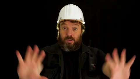 Concept idea: Bearded construction worker tries to stop someone with hand sig 스톡 동영상 121600958