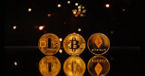Concept Idea: Bitcoin, Litecoin and Ethereum on Fireworks Background 스톡 동영상 147334409