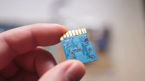 Concept Idea: Blue Bulk SD Card Board In Light 스톡 동영상 101307843