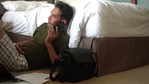 Concept idea man hold smart phone, text messaging and make a phone call 스톡 동영상 227480307