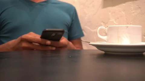 Concept idea man hold smart phone and text messaging Video stock 227503450