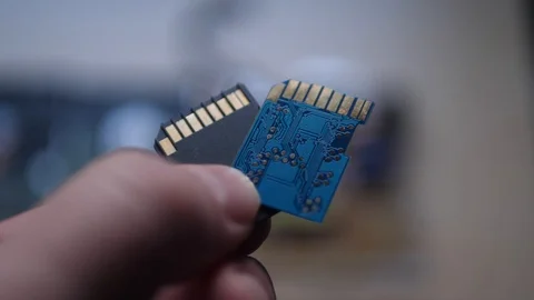 Concept Idea: SD Cards In The Male Hand 스톡 동영상 101309901