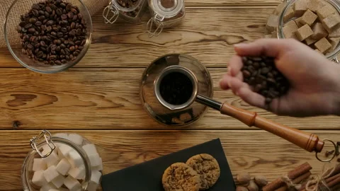 Concept for idea of traditional coffee making in cezve with roasted natural Stock Footage 138522964