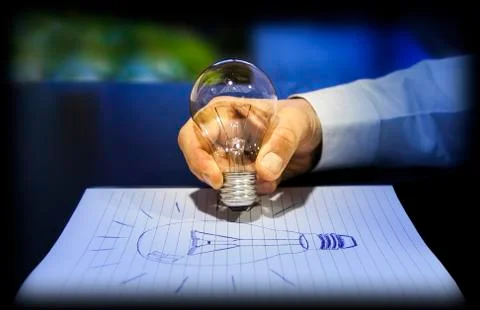 Concept of idea: writing using a light bulb Stock Photos
