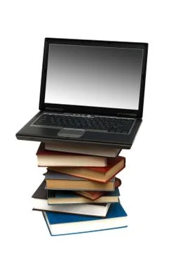 Concept illustrating evolution from books to computers Stock Photos