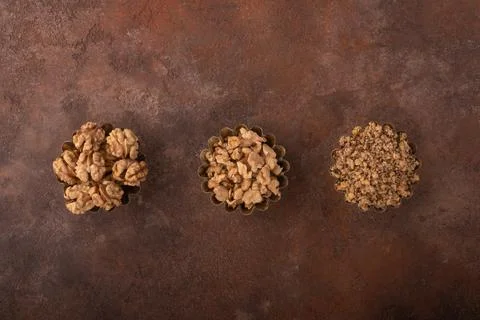 Concept image of different states of the walnut kernel. Whole walnut kernels, Stock Photos