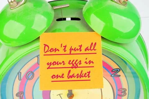 Concept Image. Do not put all your eggs in one basket Message the inscription Stock Photos