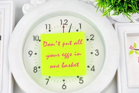 Concept Image. Do not put all your eggs in one basket Message the inscription Stock Photos