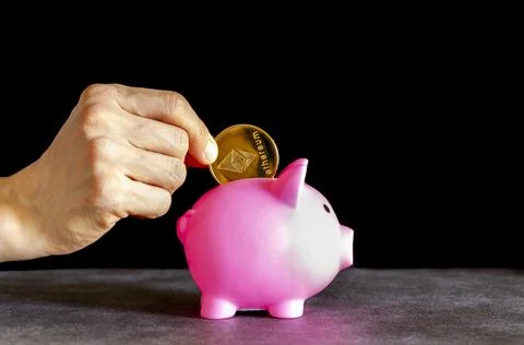 Concept image for using digital crypto currency for savings. A caucasian woma Stock Photos