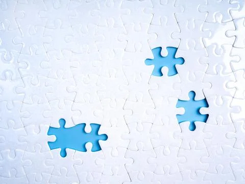 Concept of incompleteness and missing parts with three empty spaces in whit.. Stock Photos