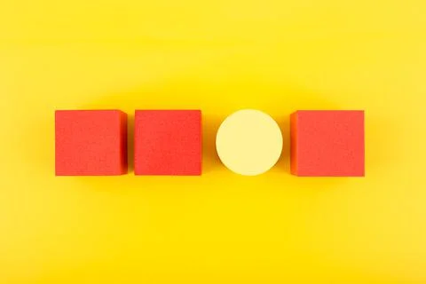 Concept of individuality and being different from others in yellow and red Stock Photos