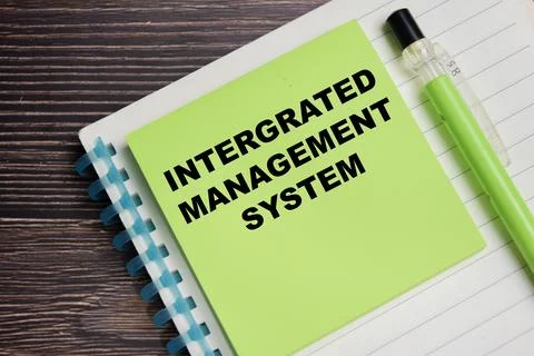 Concept of integrated management system write on sticky notes Stock Photos