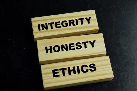 Concept of integrity, honesty and ethics text on wooden blocks. Stockfoto's