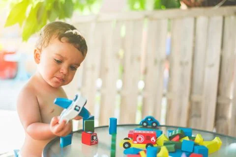 Concept of interest when trying to understand how a child flies a plane and w Stock Photos