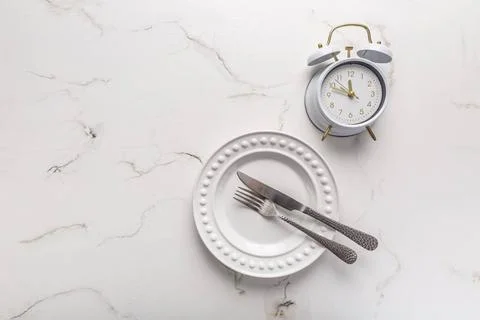 Concept of intermittent fasting Concept of intermittent fasting, empty pla... Stockfoto's