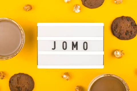 The concept of joy of missing out on bright yellow background. Stock Photos