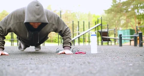 Concept of keeping yourself in shape over the age of 40 is an outdoor workout Stock Footage 196691158