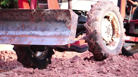 The concept, Labor Day: The man is working over labor by driving the bulldozer Stock Footage 105723963