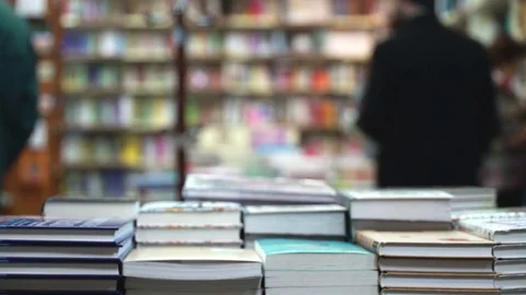 Concept learning and knowledge. Bookstore shelves with book stacks in bookstore Stock Footage 71480470