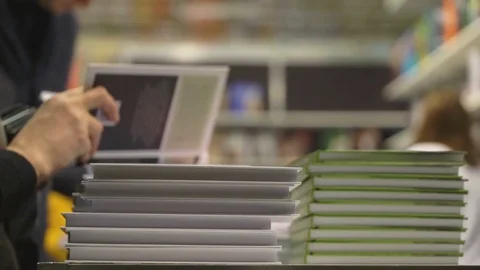 Concept learning and knowledge. Bookstore shelves with book stacks in bookstore Stock Footage 85039481
