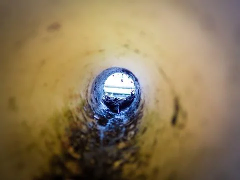 The concept of light at the end of the tunnel through the pipe Stock Photos