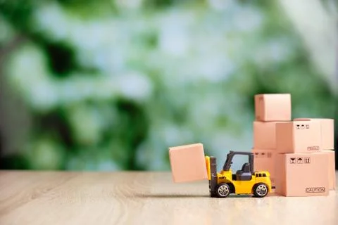 Concept of loading goods in packaging by forklift copy space Foto stock