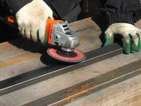 The concept of locksmith work, processing of metal products. Stock Photos
