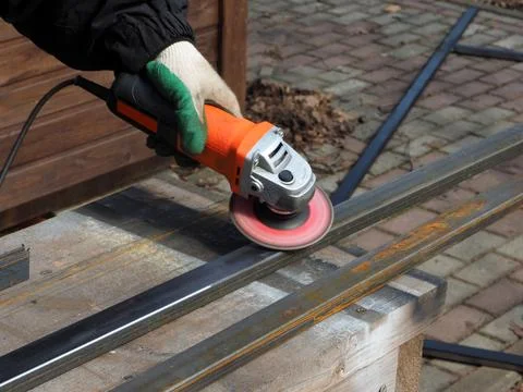 The concept of locksmith work, processing of metal products. Stock Photos