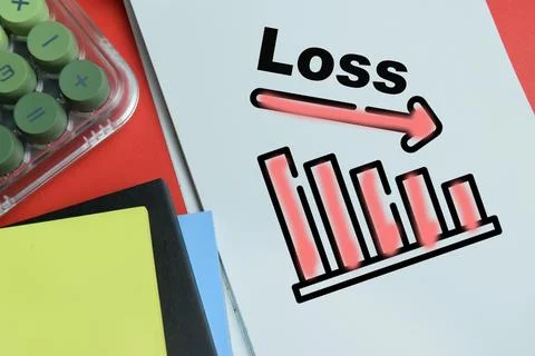 Concept of loss graph write on book isolated on table. For financial crisis. Stock Photos