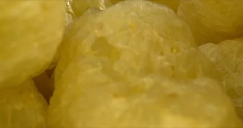 Concept of machine making puff snack food. Snack factories. Puffcorn chips close Stock Footage 148925819