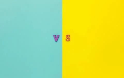 The concept of making choice. Versus letters. Stock Photos
