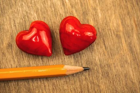 Concept of making love relationship with working on yourself, two red hearts  Stock Photos