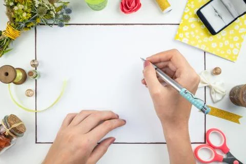 Concept of making poster or slogan for a wedding or anniversary on postcard. Stock Photos