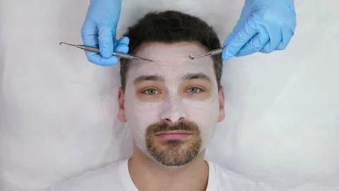 Concept of male face therapy Stock Footage 148624258