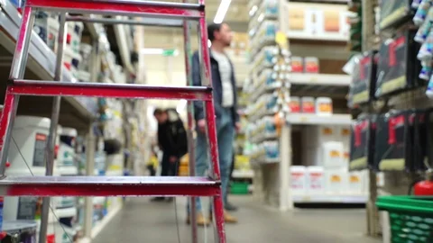 Concept man shopping in construction hypermarket. POV bottom view from the Stock Footage