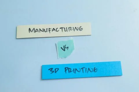 Concept of Manufaturing vs 3D Printing write on sticky notes 写真素材
