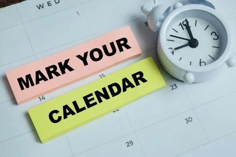 Concept of mark your calendar write on sticky notes isolated on Wooden Table. Stock Photos