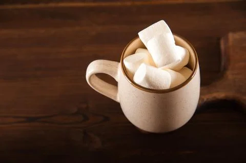  Concept with marshmallows in a circle on a dark background. Autumn, coffee, tea Stock Photos