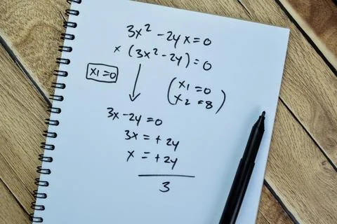 Concept of math formulas write on book isolated on Wooden Table. Foto stock