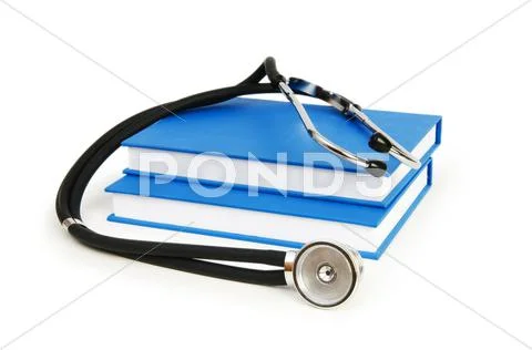 Concept of medical education with book and stethoscope Stock Photos