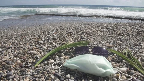 Concept medical mask on the beach Stock Footage 131260853