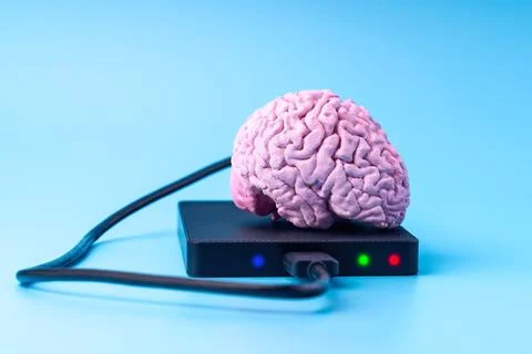 Concept of memory problem in a person. An external hard drive is connected to Foto stock